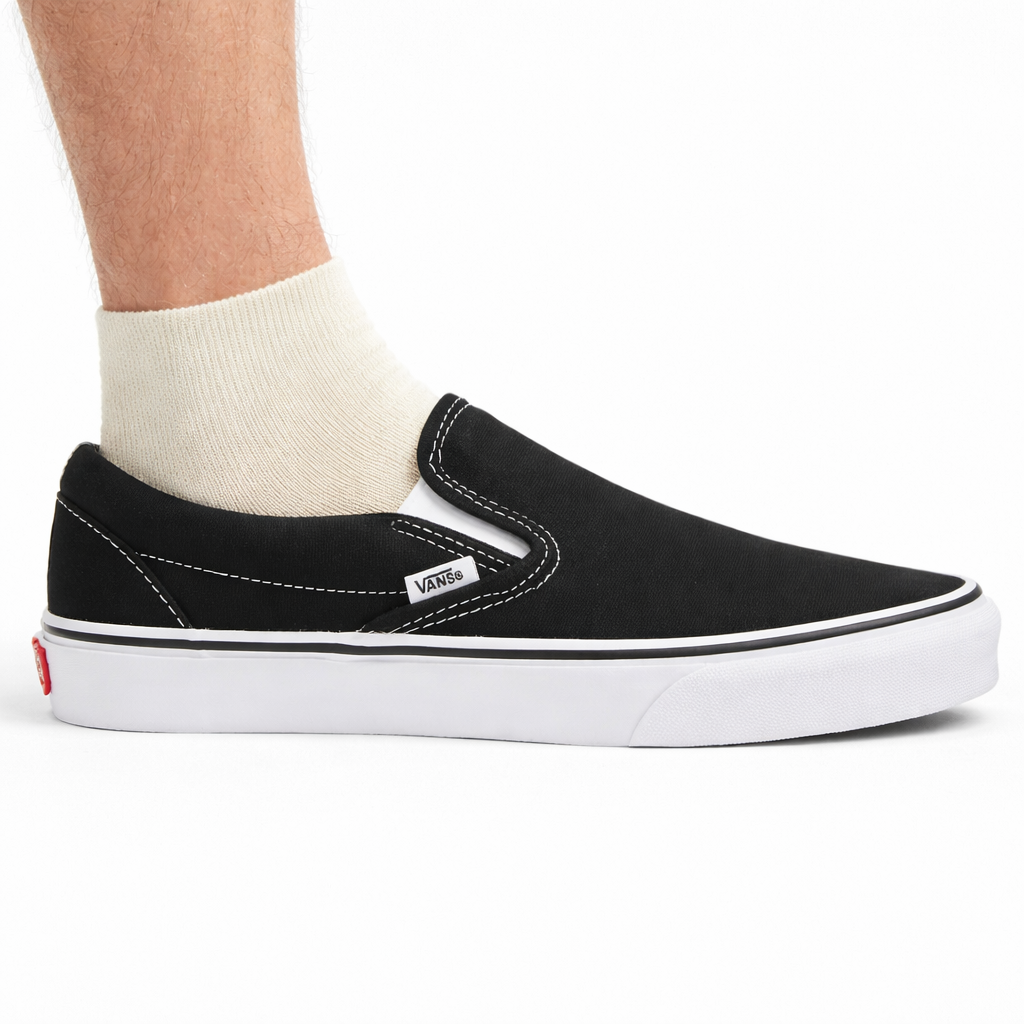 Vans Men's Black Classic Slip‑On Canvas Sneakers, VN000EYEBLK